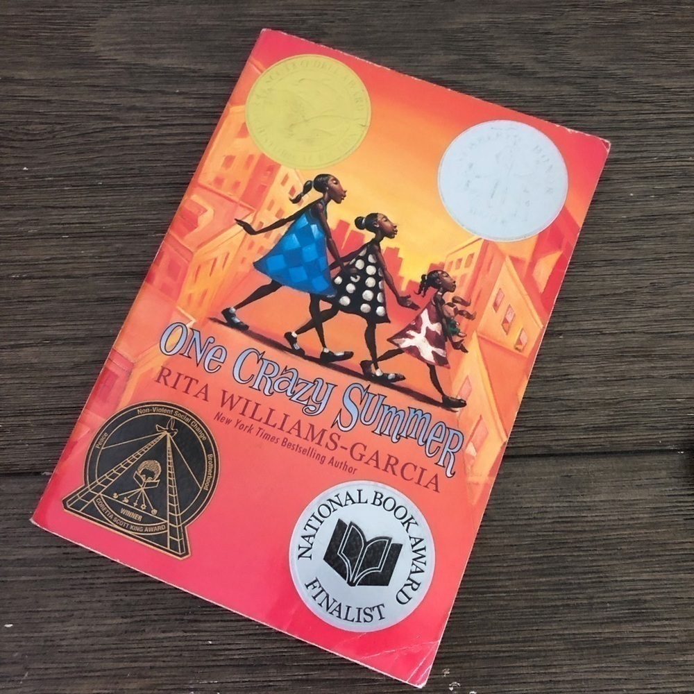 One Crazy Summer by: Rita Williams-Garia paperback book